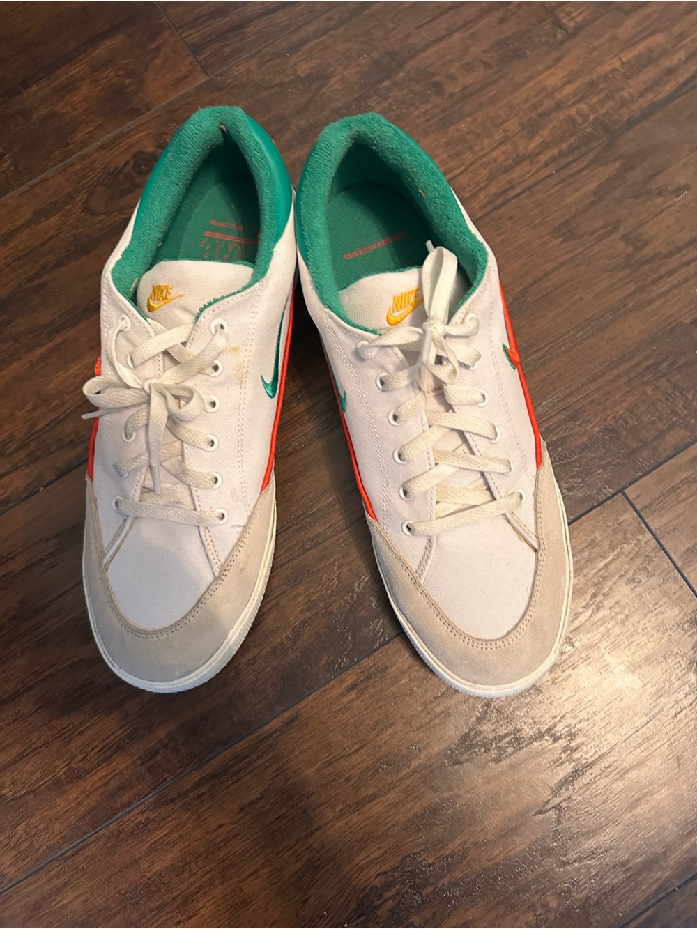 Nike Men’s White Sneakers with Green Lining and Orange Accents